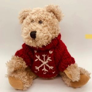 Fuzzy, new tan teddy bear wearing red sweater
